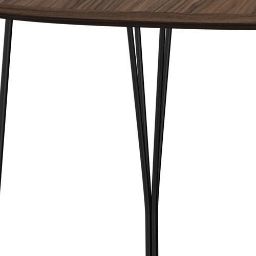 Fritz Hansen Superellipse Mesa de comedor Negra/nueces con borde de mesa de nogal, 170x100 cm