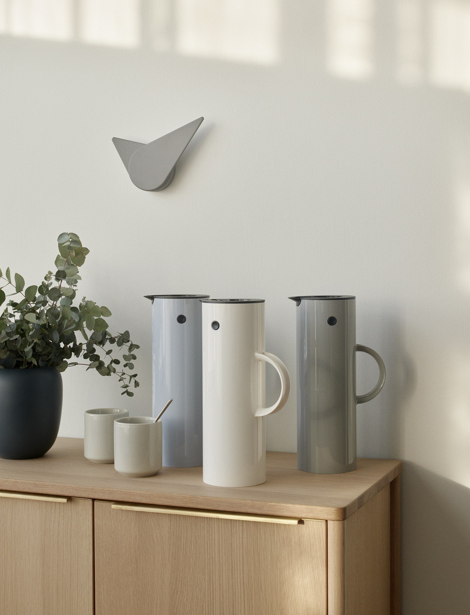 Horloge murale de Stelton Birdie, gris clair