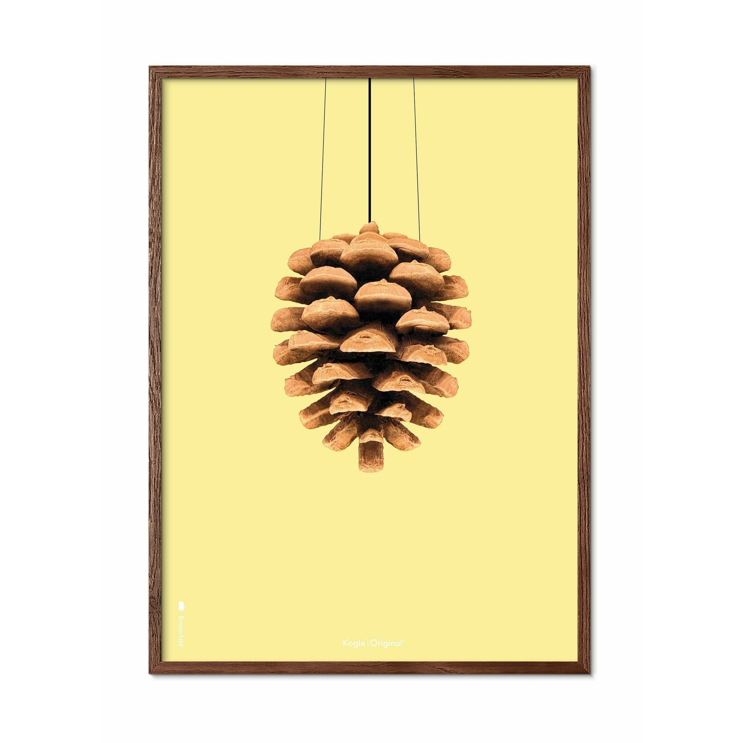 Brainchild Pine Cone Classic Poster, dunkler Holzrahmen 50x70 cm, gelber Hintergrund