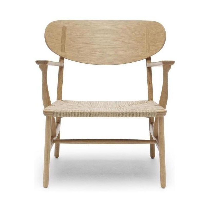 Carl Hansen CH22 Lounge -stol, oljad ek/naturlig sladd