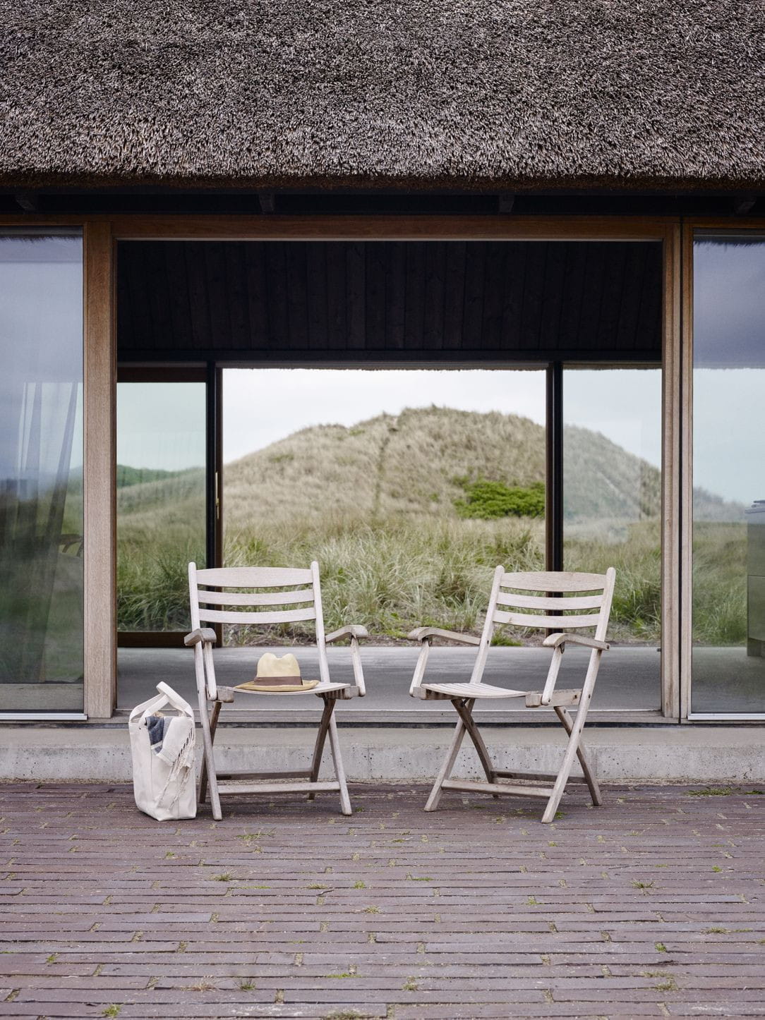 Silla plegable de Skagerak Selandia con reposabrazos