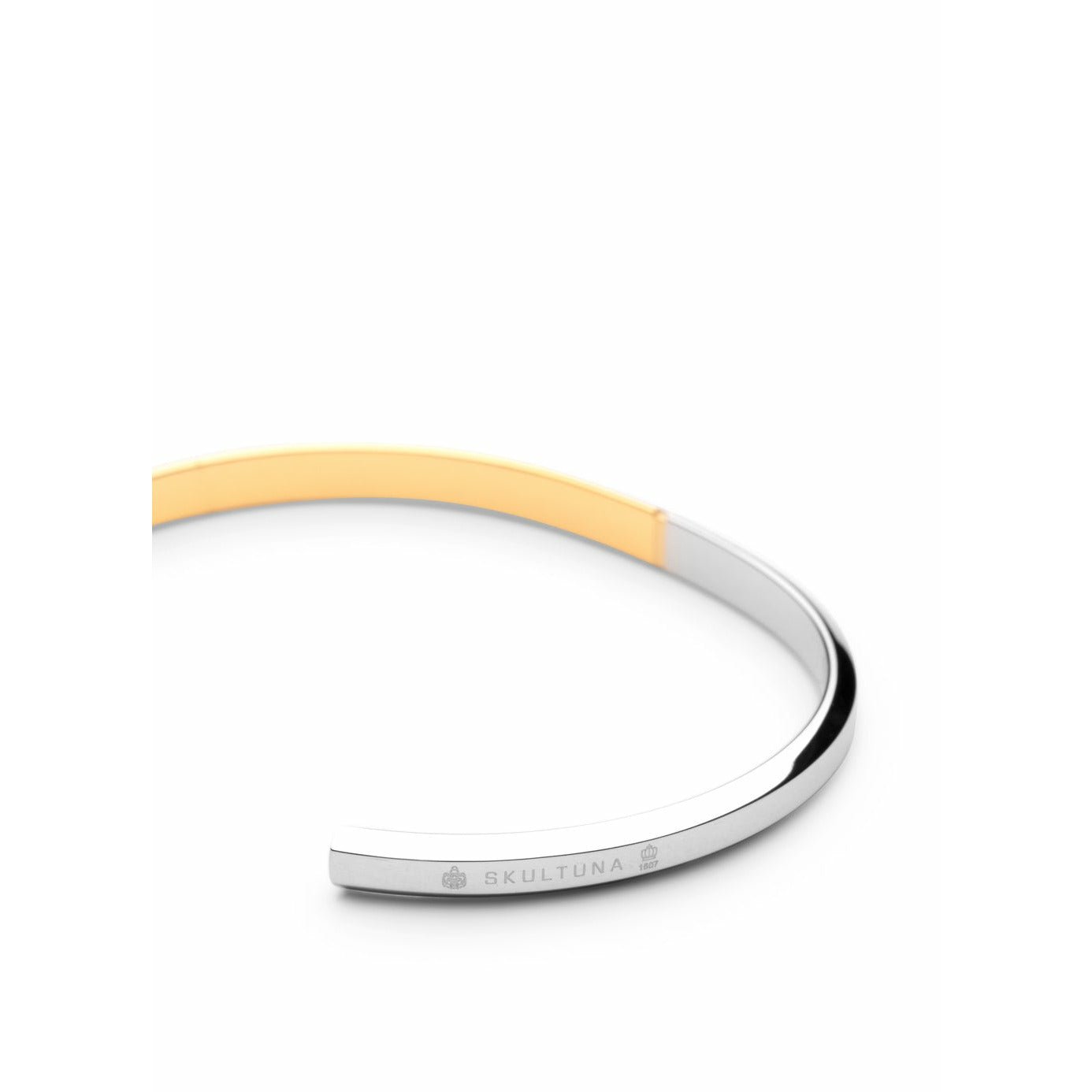 Skultuna -ikonen tunn armband stort polerat stål/guldpläterat, Ø18,5 cm